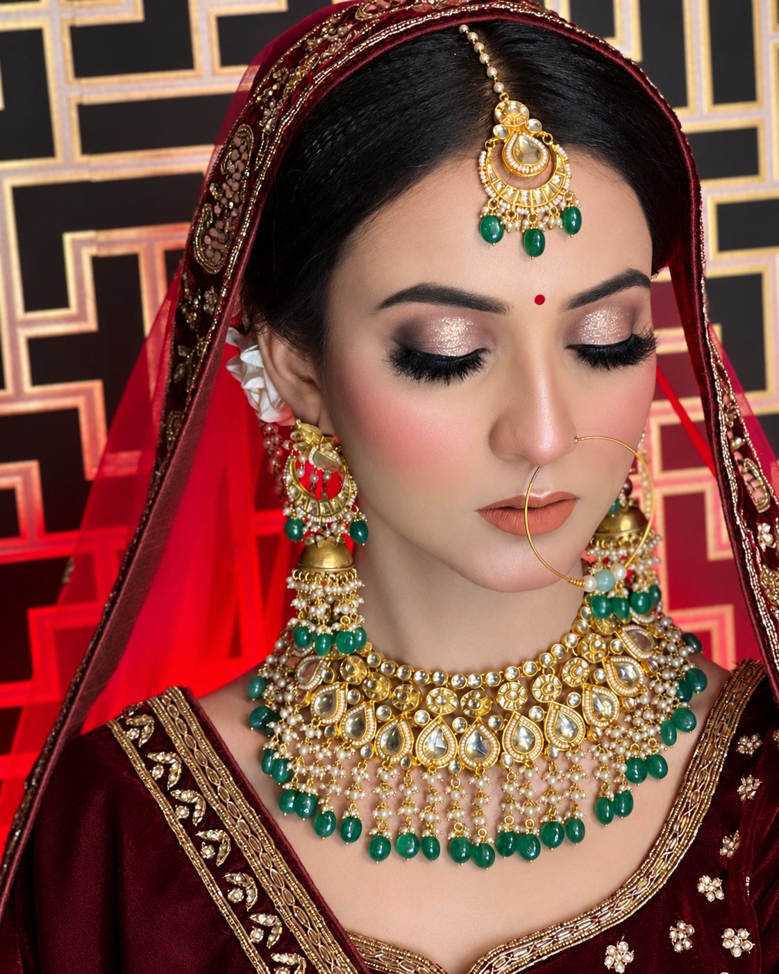 Bridal makeup by Chandresh Makeover, Jhansi — red lehenga, kundan jewellery